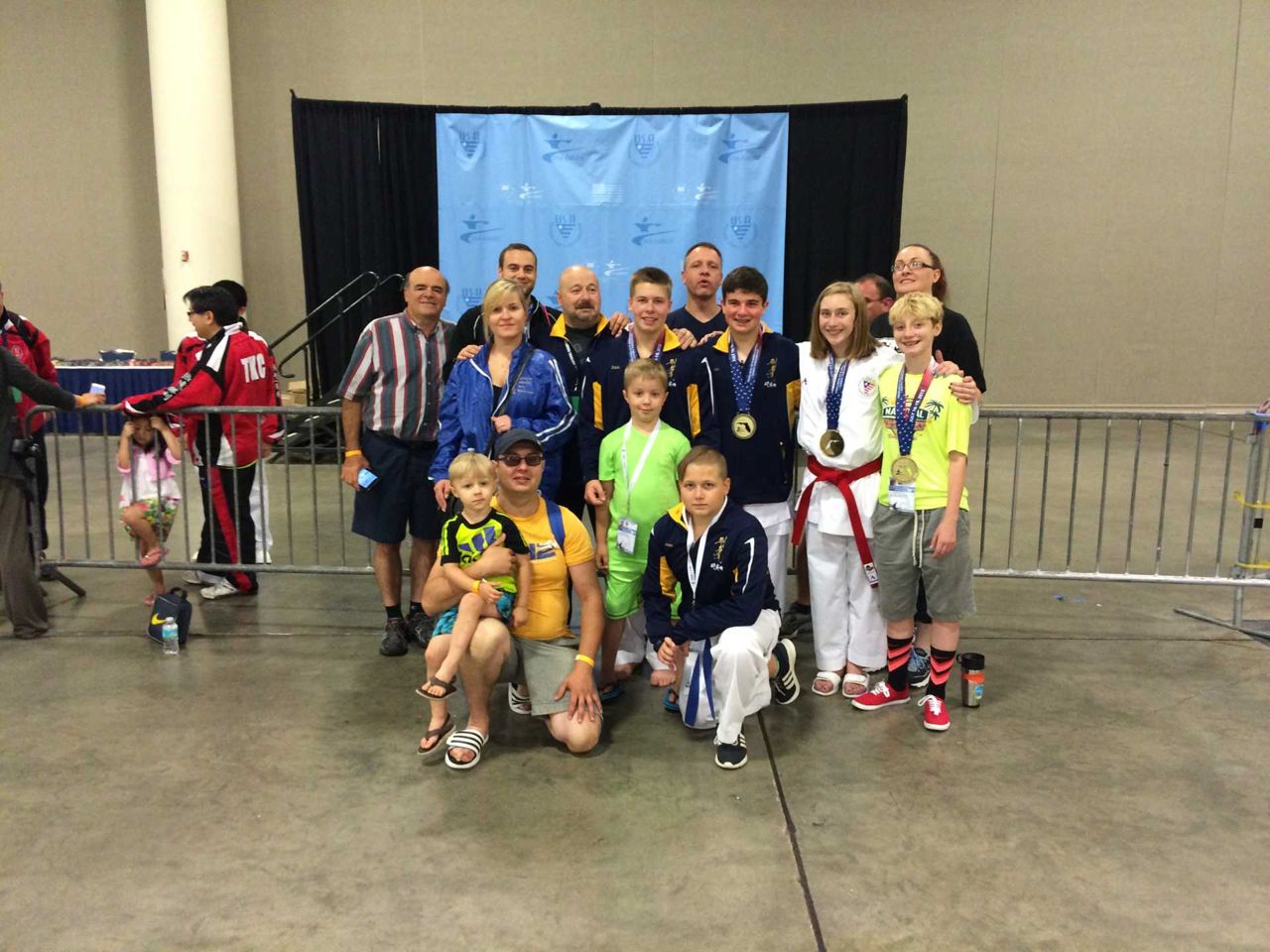 Young competitors and coaches at an event