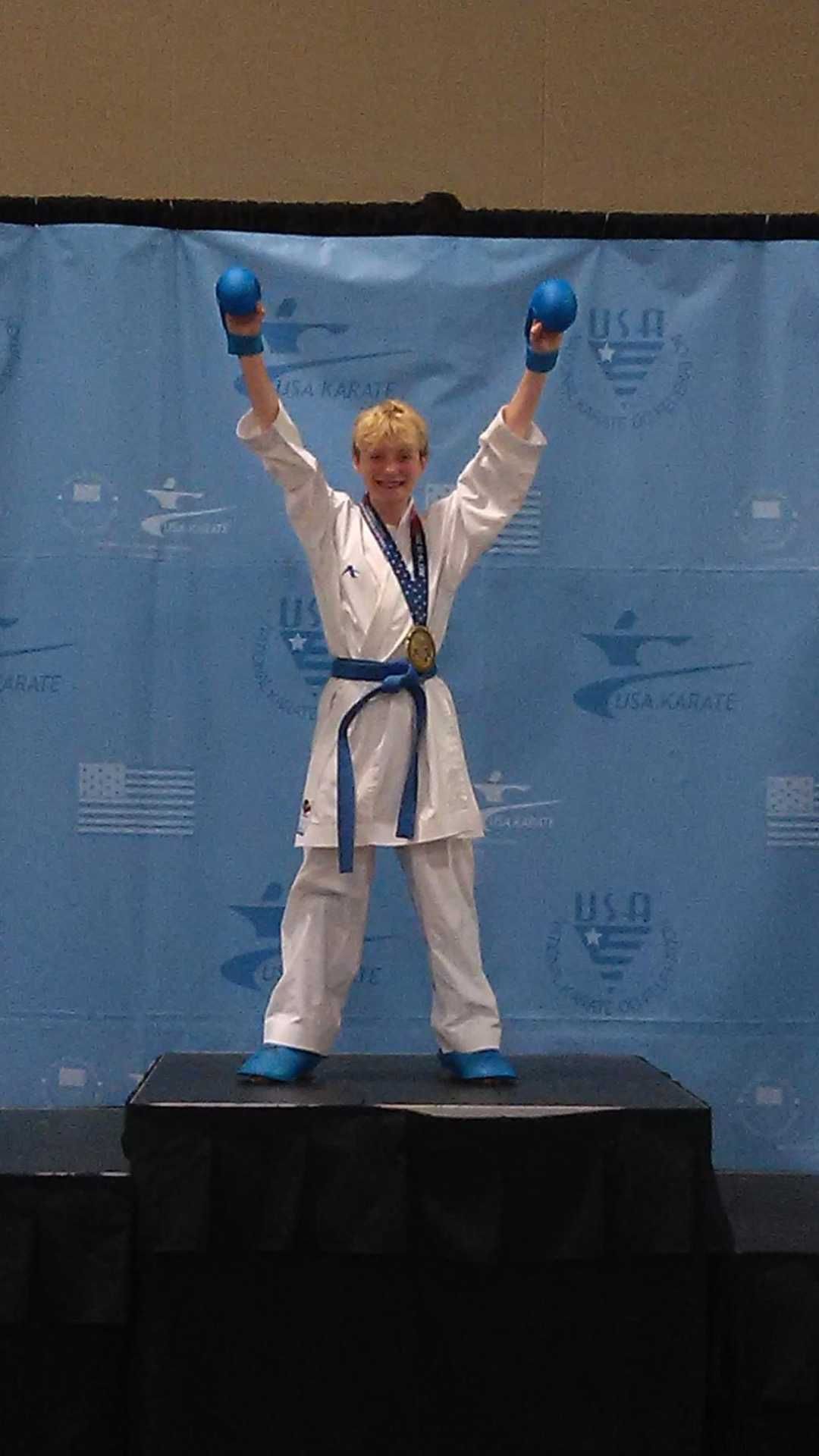 Athlete celebrating a win on the podium